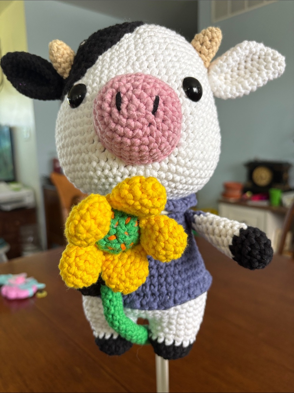 Handmade Crochet Cow Plush Toy with Yellow Flower